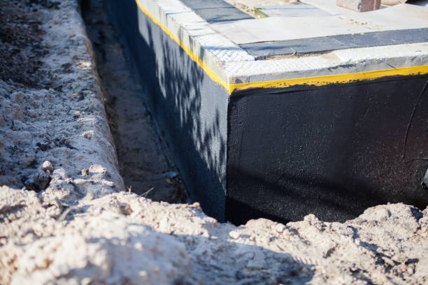 Professional Waterproofing technician working in Philadelphia, TN